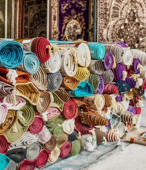 heap-of-rolled-up-rugs-in-rug-store-2025-01-08-03-50-31-utc